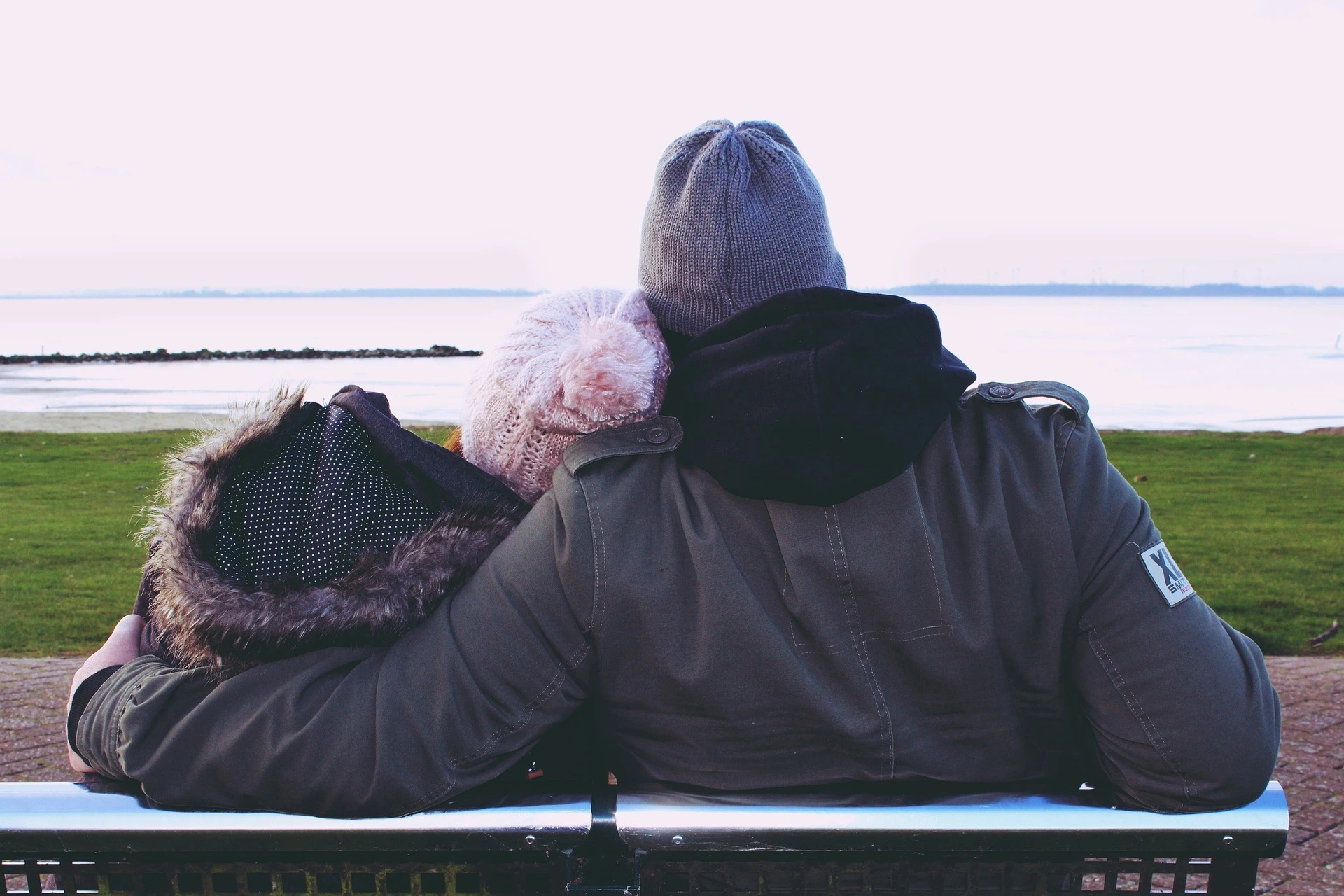 man and woman on bench